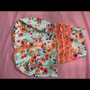 Ruffle Butts swimsuit, gently used. Size 12-18m